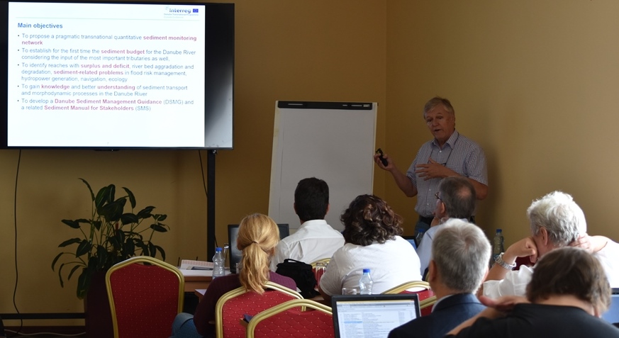 Peter Bakonyi holding a presentation in front of meeting participants, Credits: MCTI - Directorate for Inland Waterways, Serbia